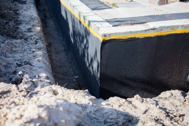 Professional Waterproofing technician working in Stockton, AL